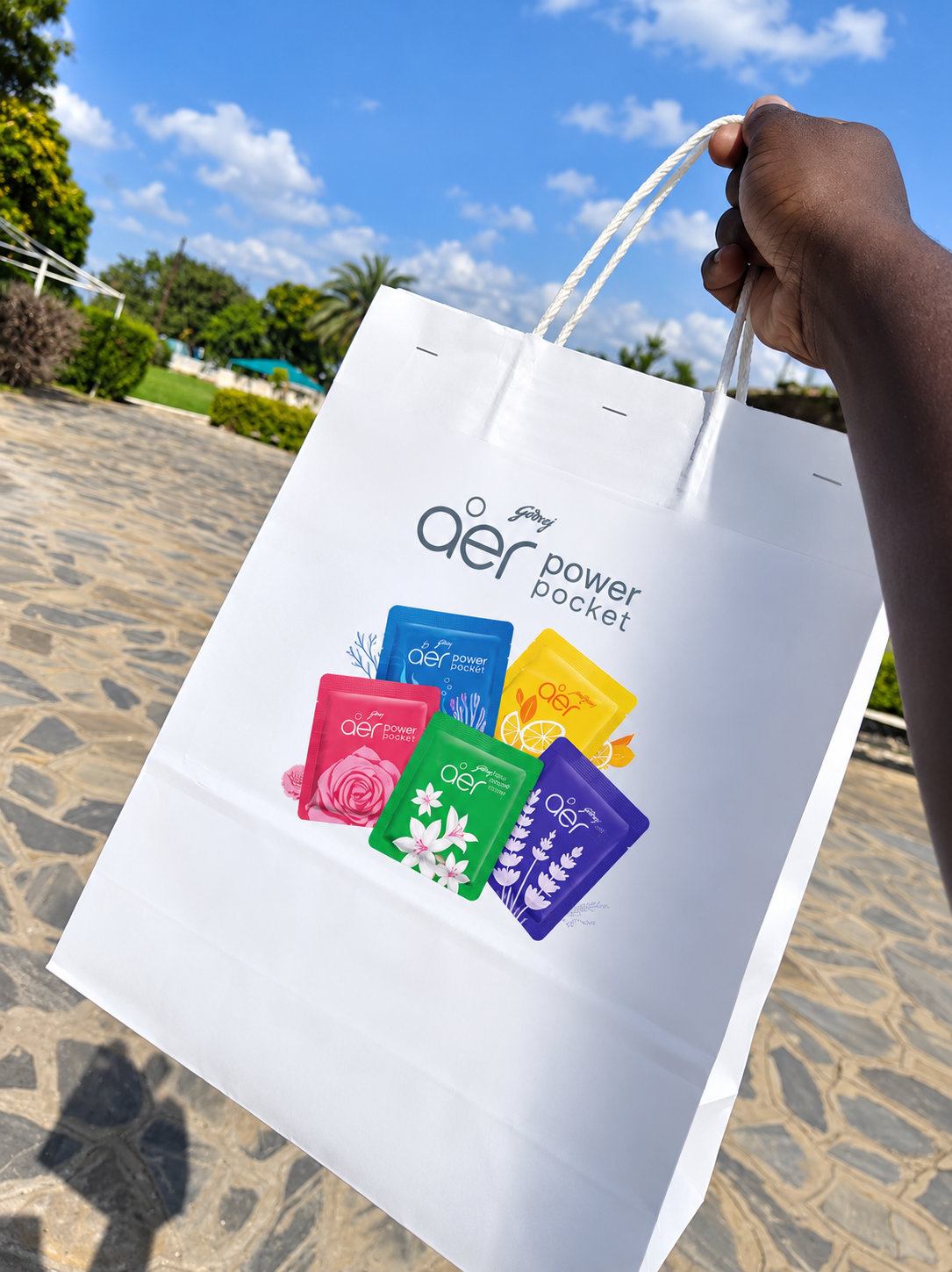 AER Power Pocket brand pack — branded bag with the full sachet range