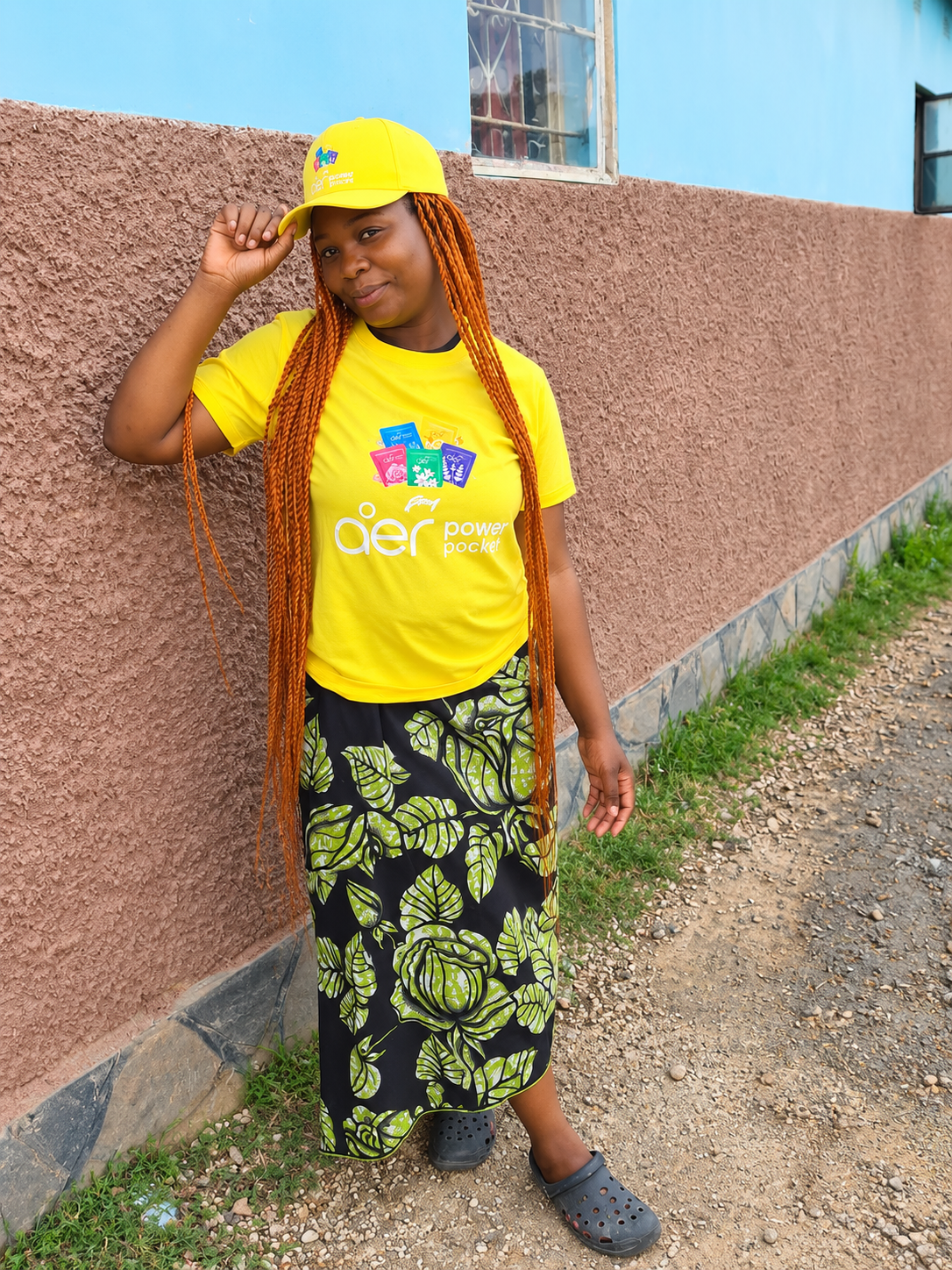 Influencer in full AER kit photographed outdoors in Lusaka