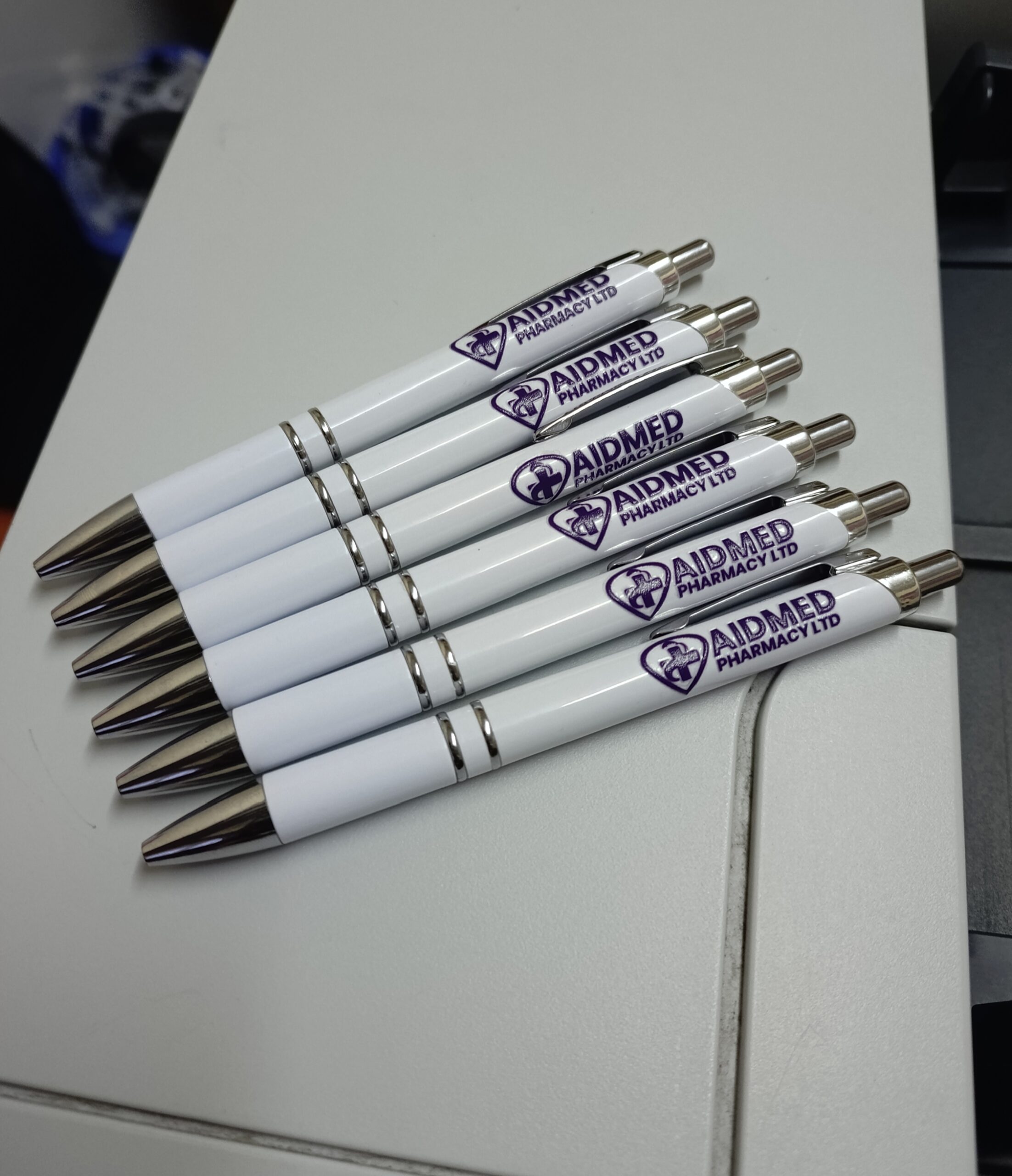 Batch of branded promotional pens ready for despatch