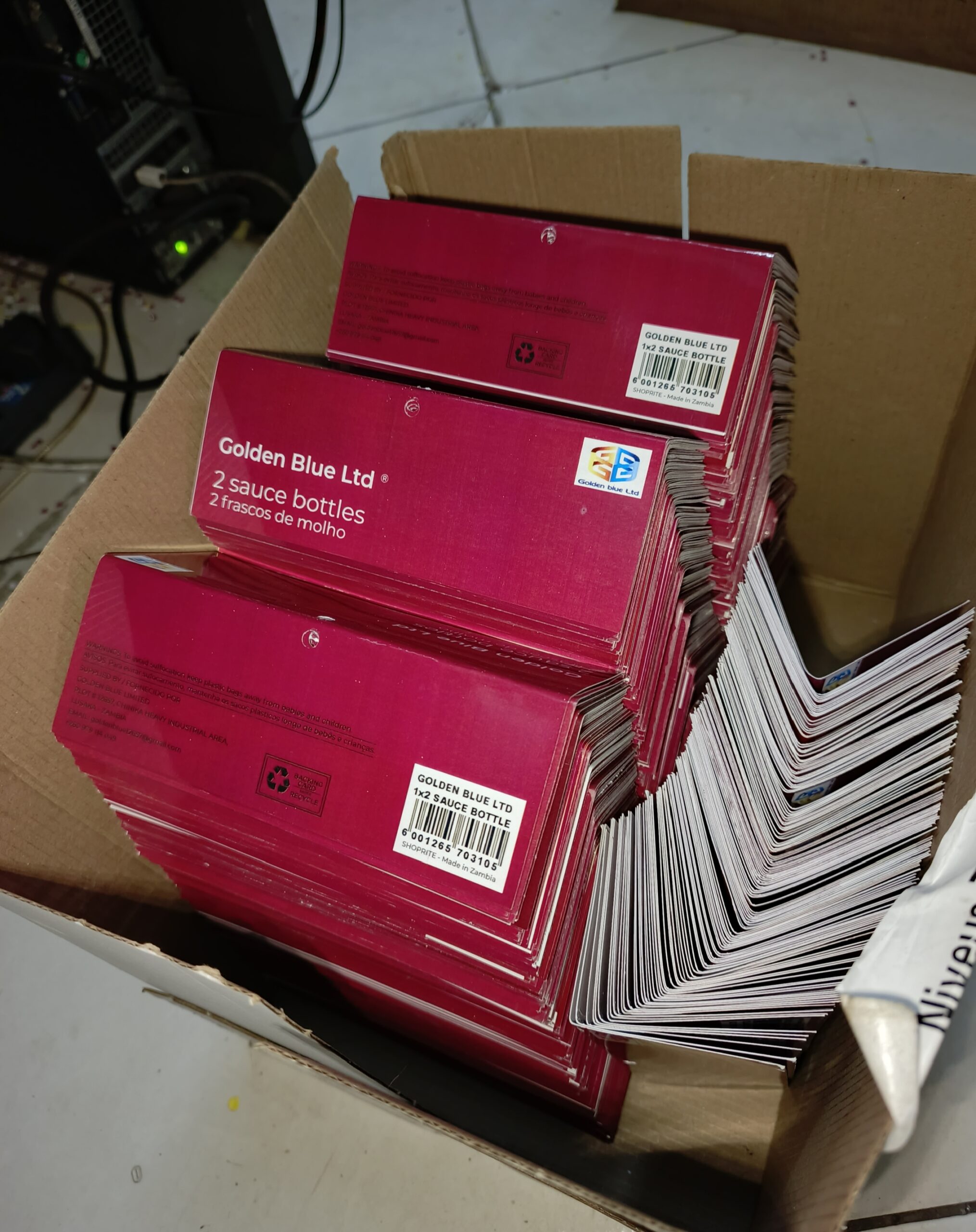 Stacked printed cartons produced for Golden Blue Limited