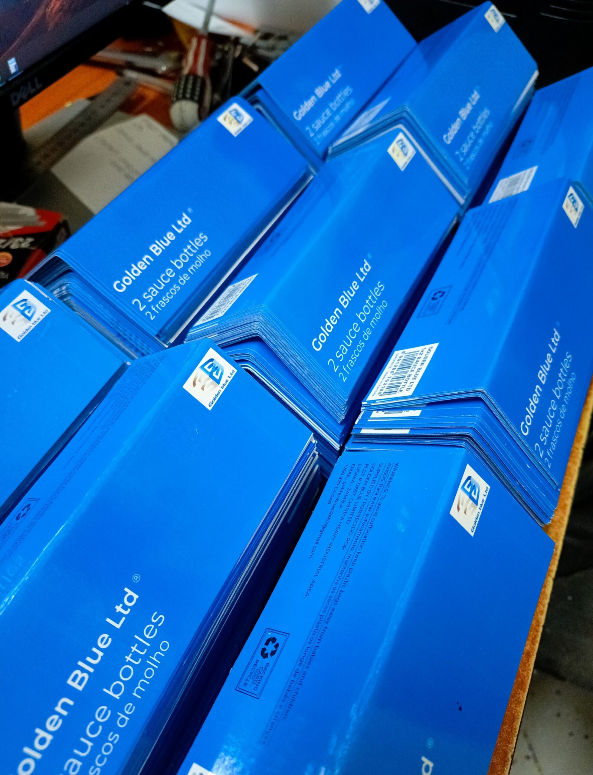 Bilingual export cartons produced for Golden Blue Limited