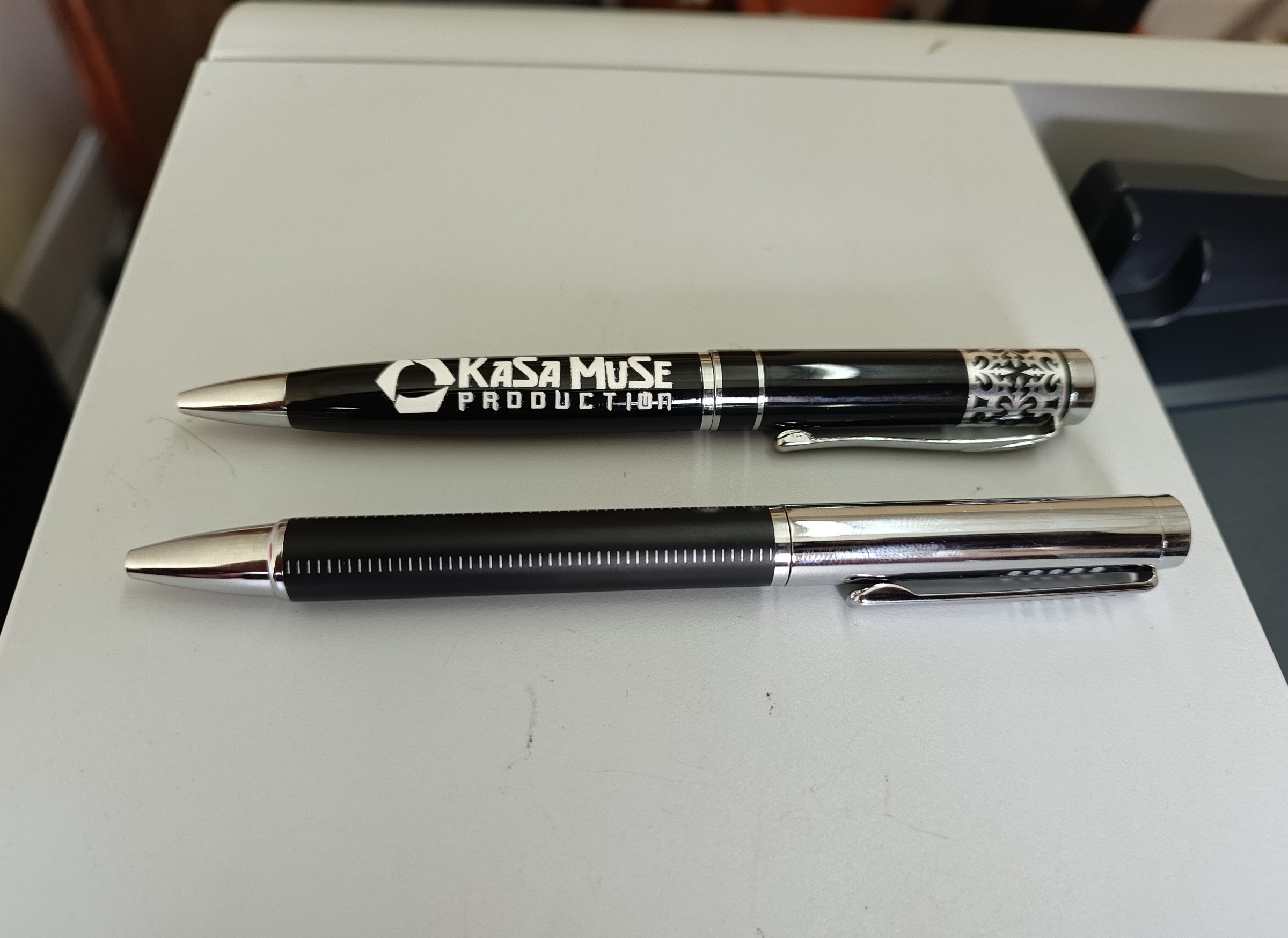 Engraved metal pens produced for KaSaMuSe Production