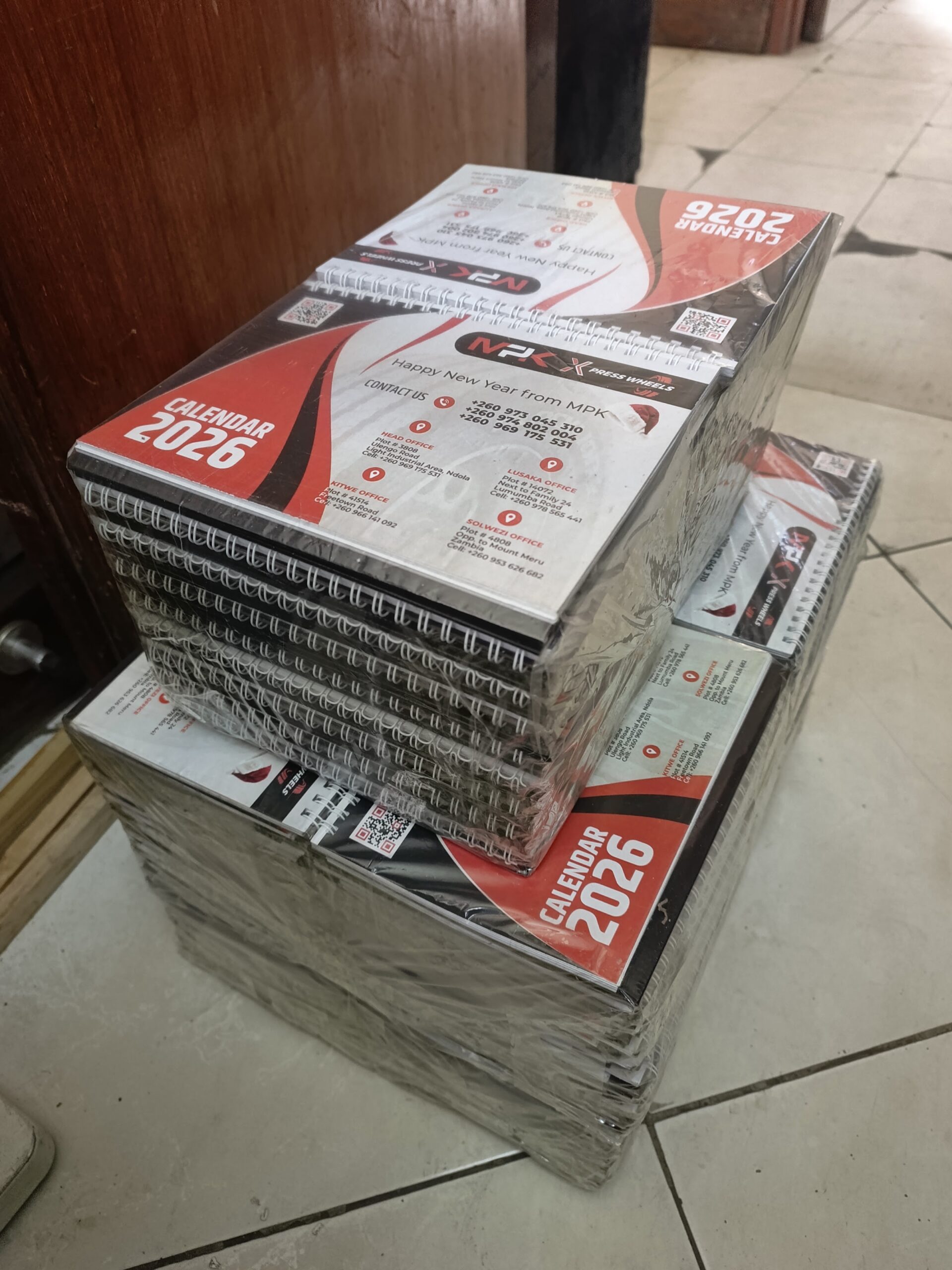 Boxed 2026 wall calendars produced for MPK Express Wheels