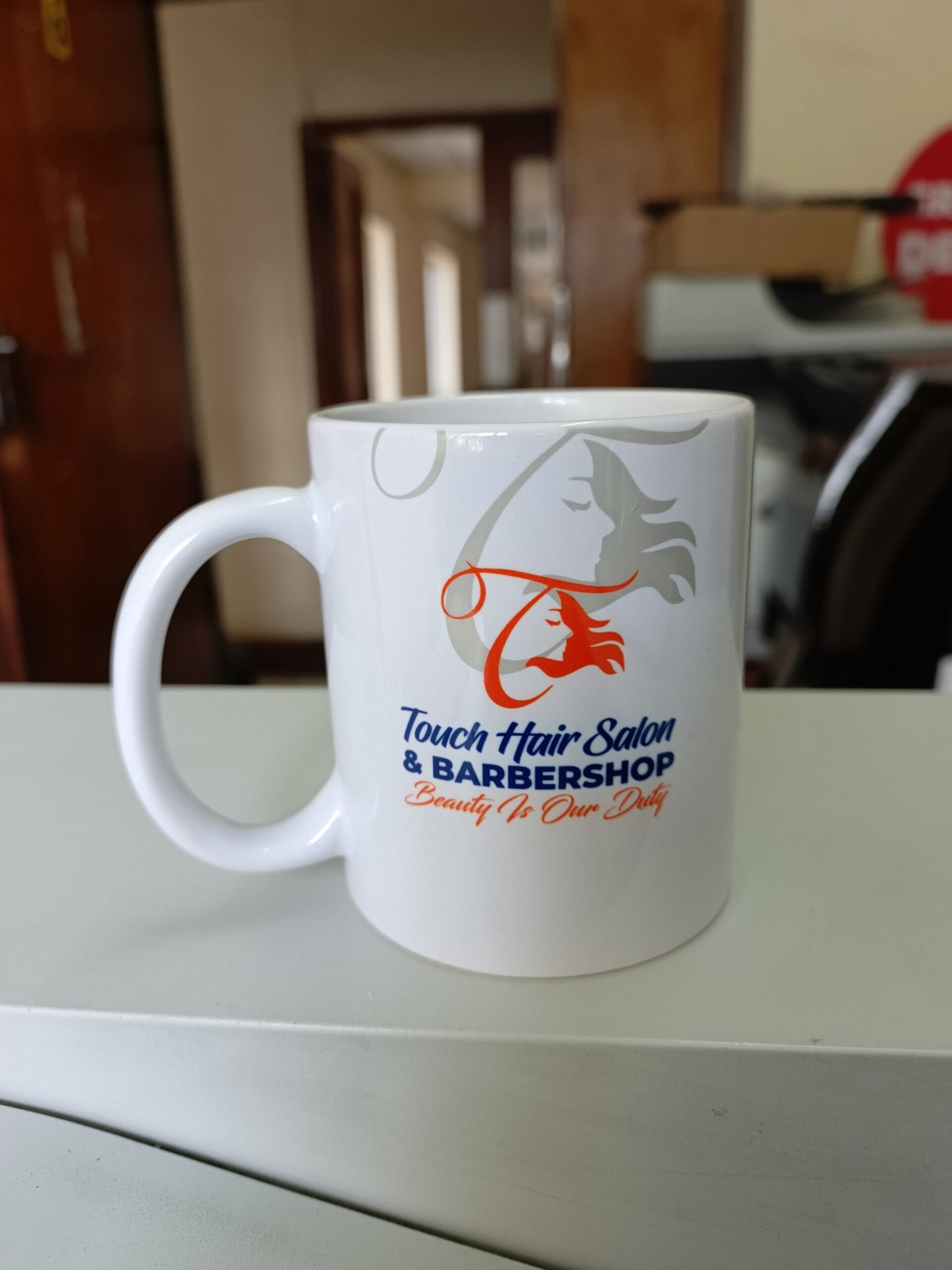 Single branded mug produced for Touch Hair Salon and Barbershop