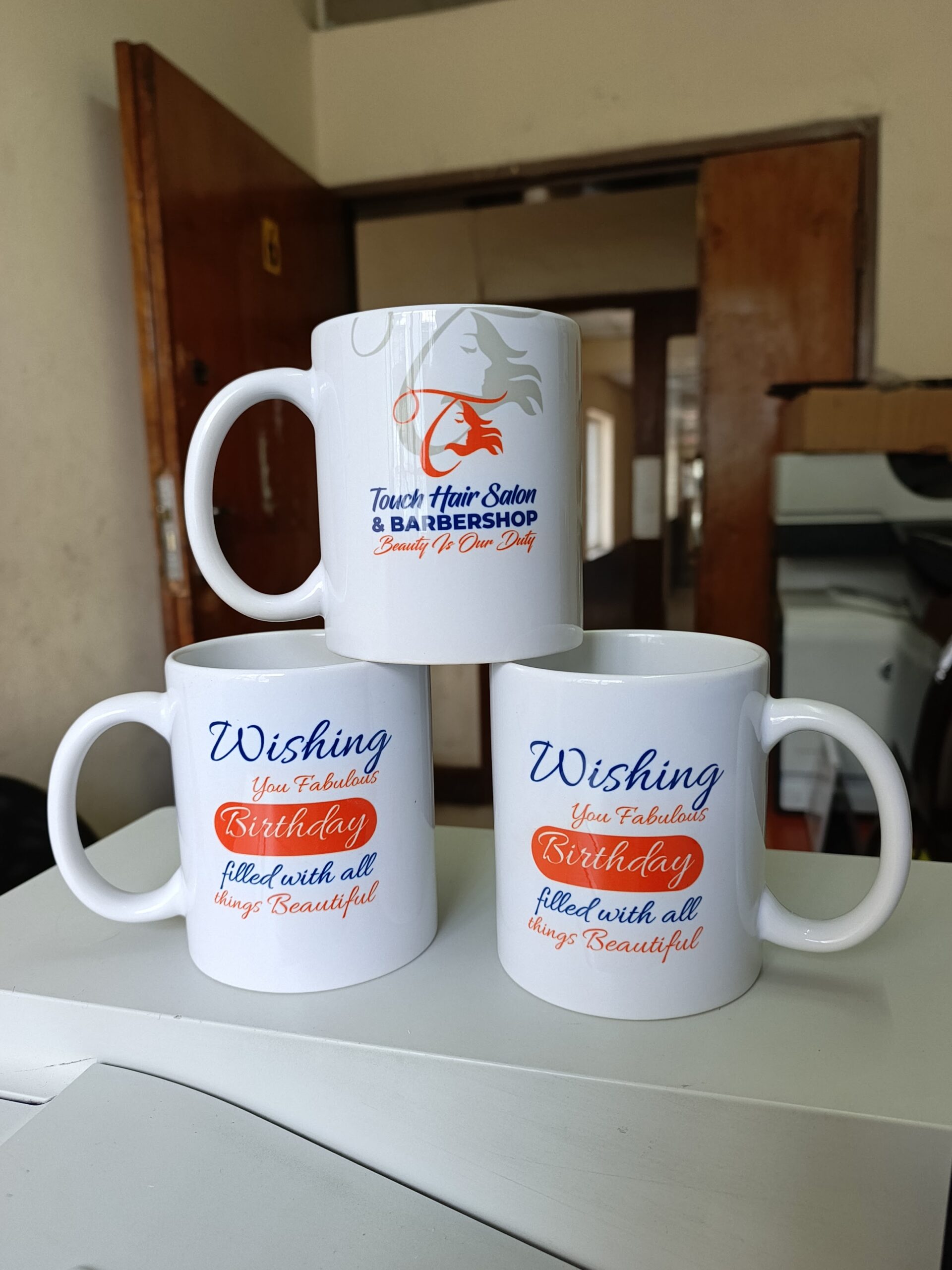 Printed mugs produced for Touch Hair Salon and Barbershop
